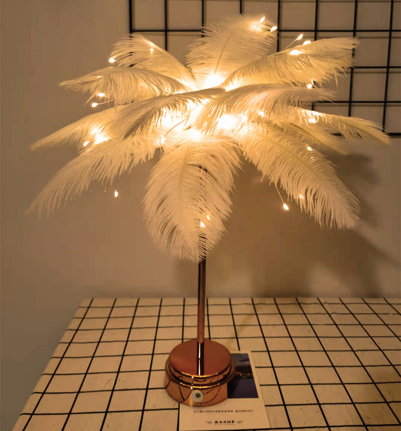 Elagant nightlight with feathers for pleasant illumination