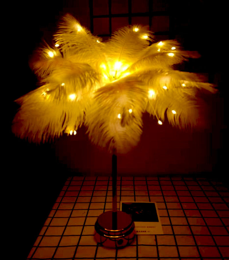 Elagant nightlight with feathers for pleasant illumination