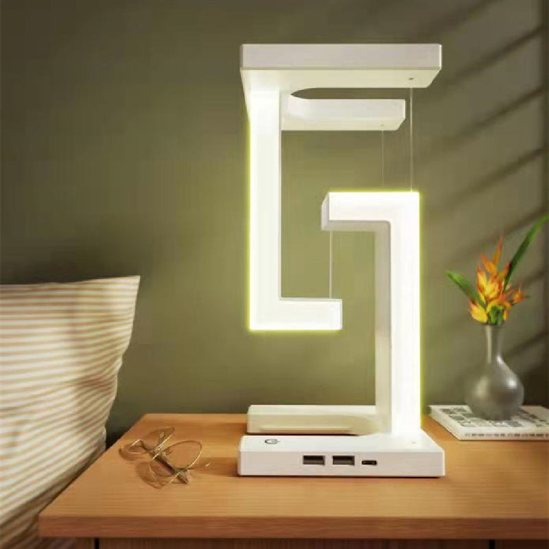 Antigravity wireless charging table lamp