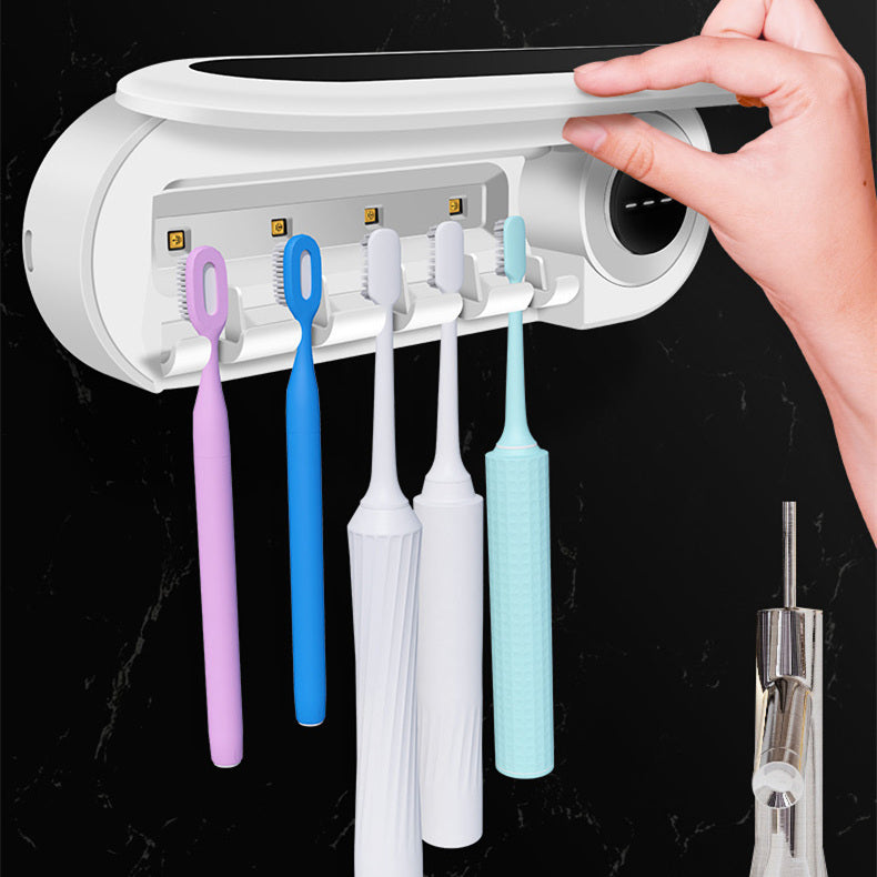 Wall mounted toothbrush holder with UV-sterilization